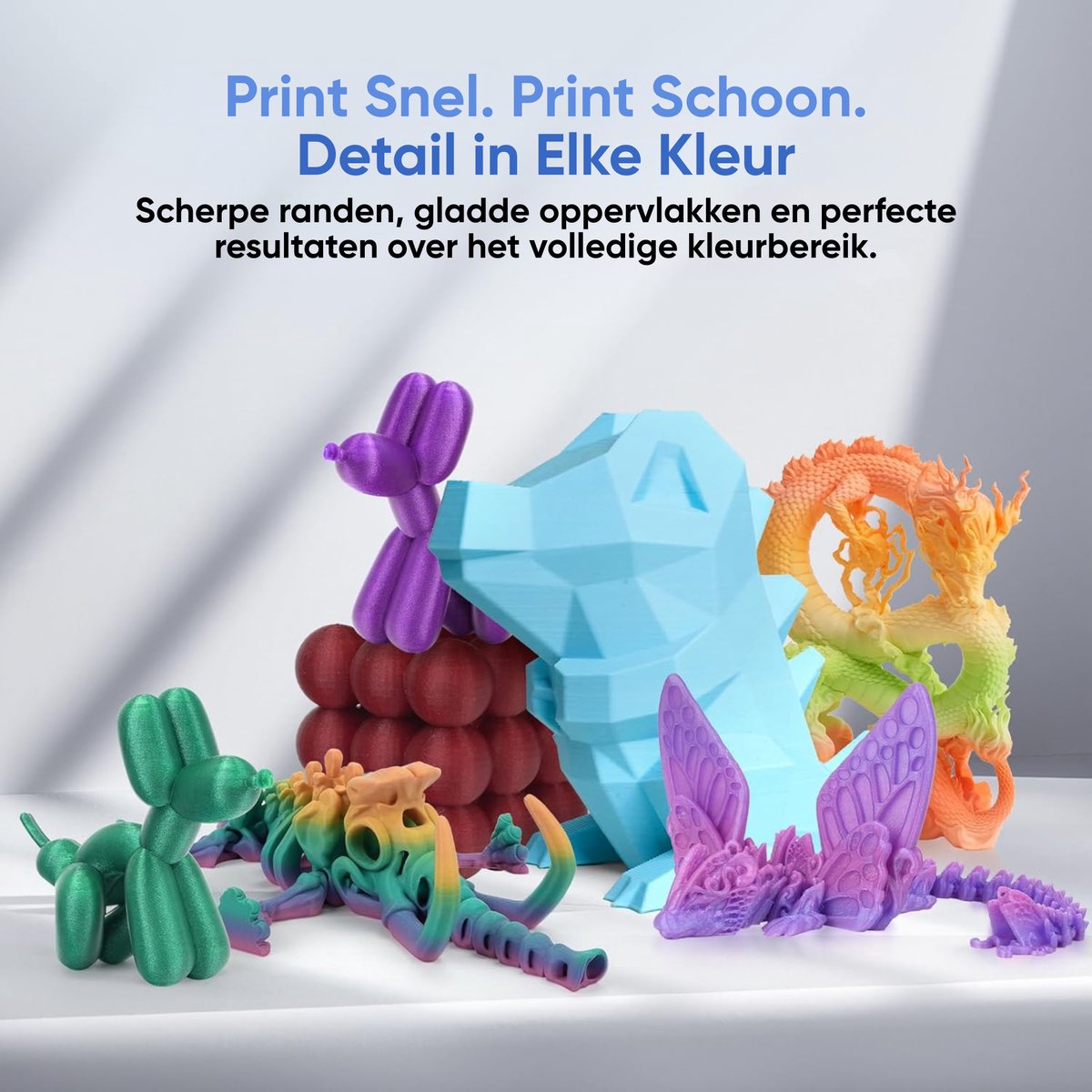 Kleurrijke 3D-prints in PLA, waaronder een ballonhond, een geometrische hond en draken